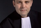 Mr. P.A. van Hecke. Advocaat.